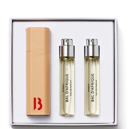 Byredo Bal d'Afrique Eau de Parfum three 12ml vials and tan leather travel case on a white background