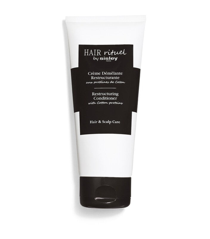 Sisley Hair Rituel Restructuring Conditioner 200ml tube on a white background