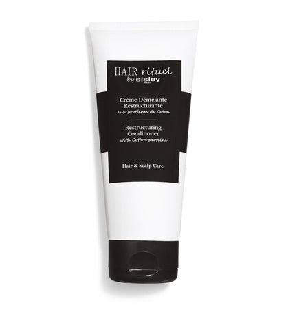 Sisley Hair Rituel Restructuring Conditioner 200ml tube on a white background
